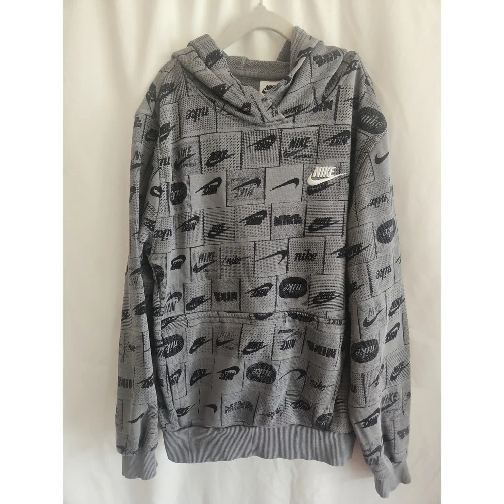 Child's Nike Hooded Sweatshirt Size Large With Overall Logo Print